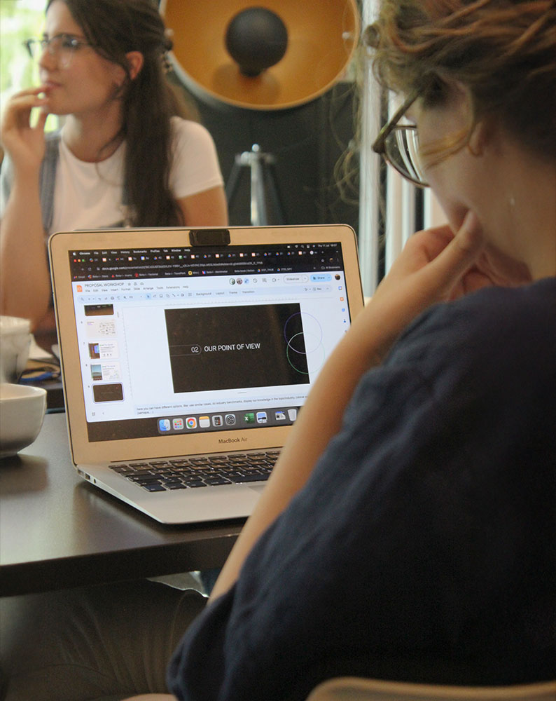 Woman focused working on her laptop